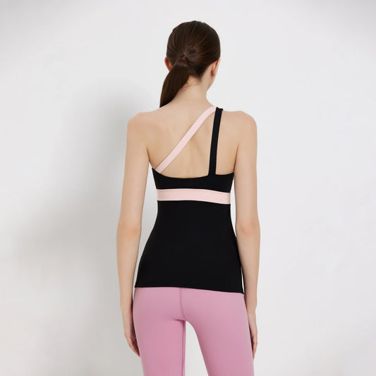 Back view of a stylish Balance Tank Top showcasing its sleek design and straps in black and pink.