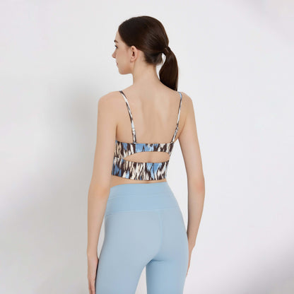 Soft Splash Bra Top featuring a stylish design and cut-out back, perfect for workouts and casual wear.