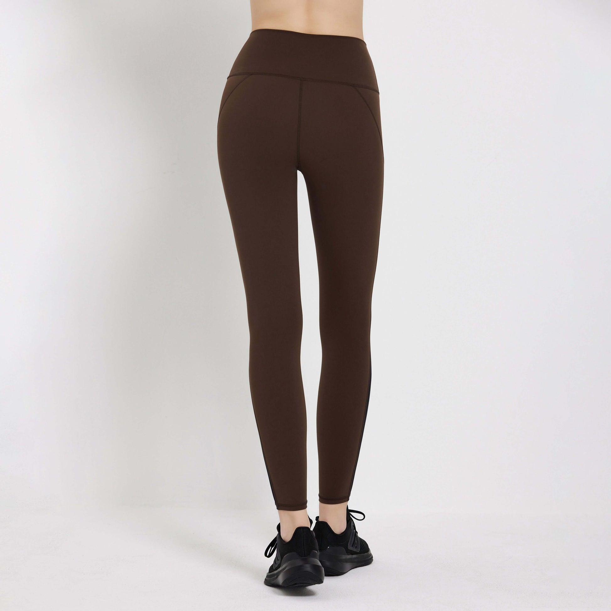 Back view of brown Impact Legging showcasing a high waistband and sleek fit perfect for workouts.