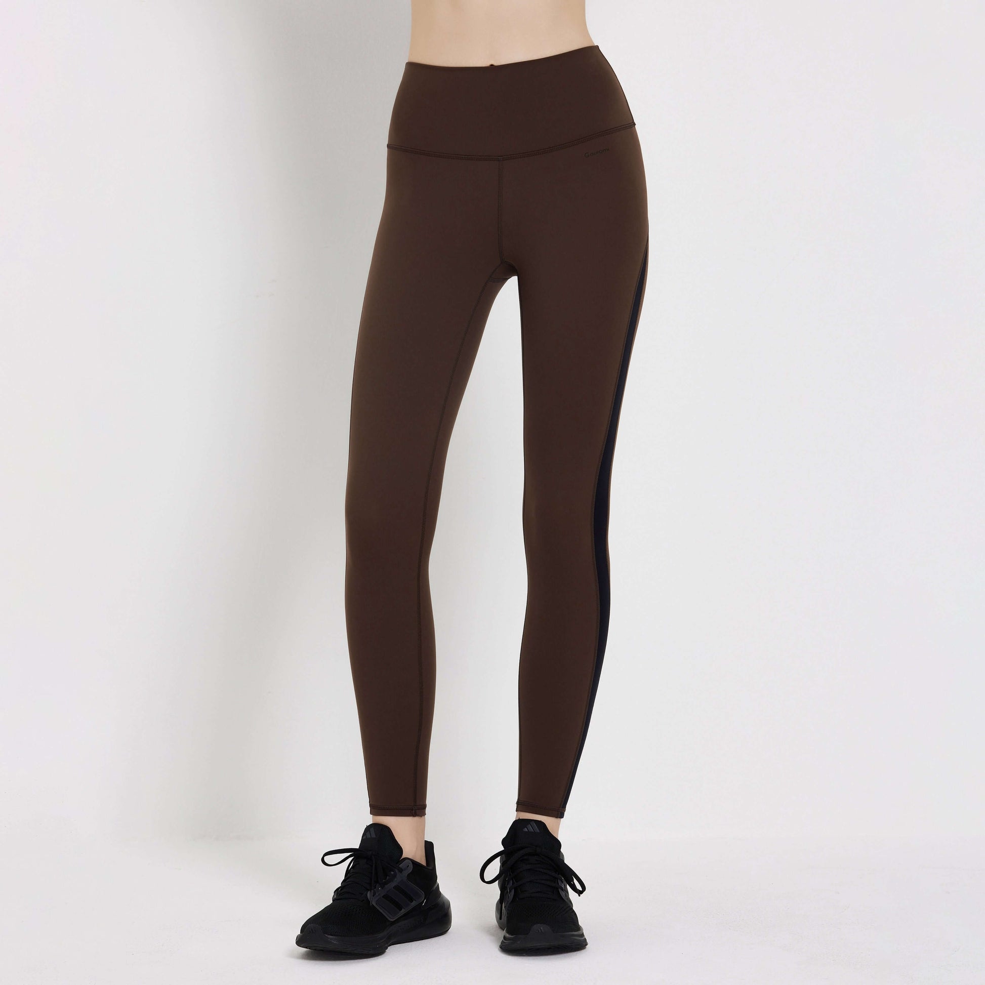 Impact Legging in brown with side panel details, ideal for workouts and casual wear.