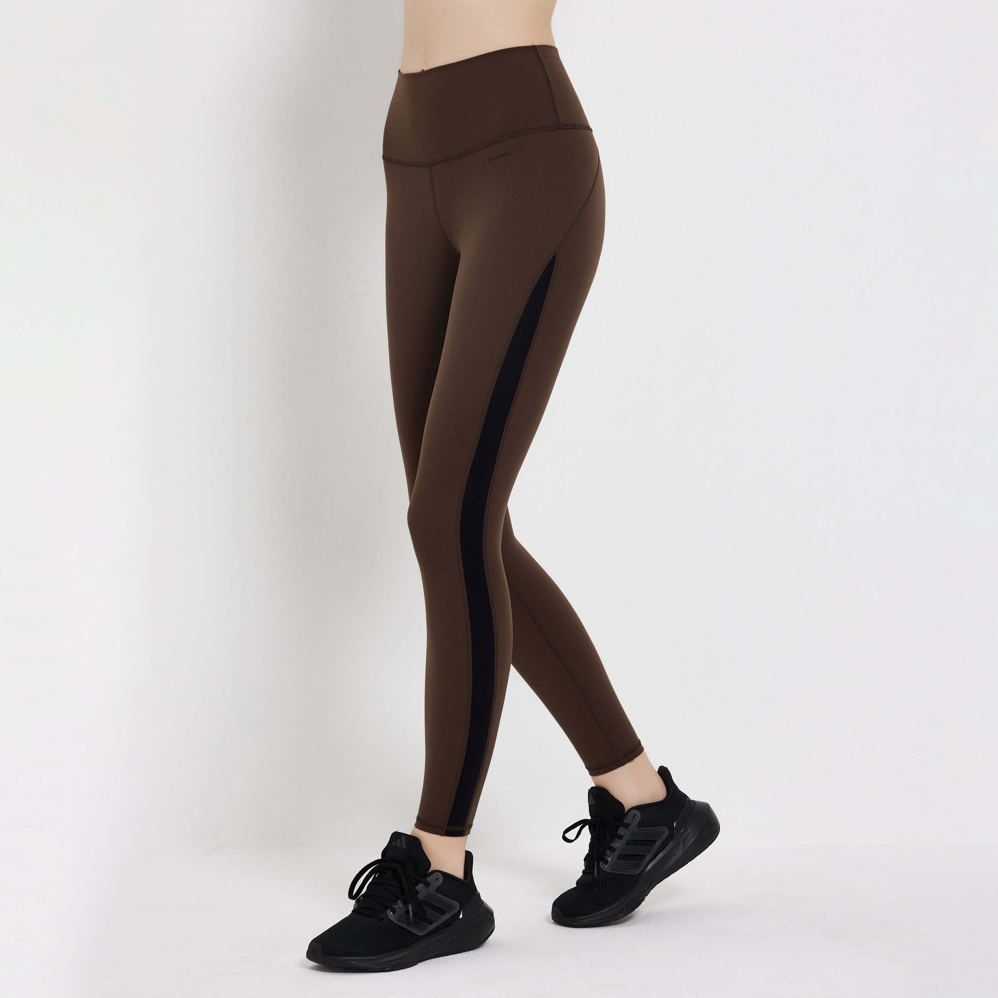 Brown Impact Legging with side panel detailing, perfect for workouts and fitness activities.