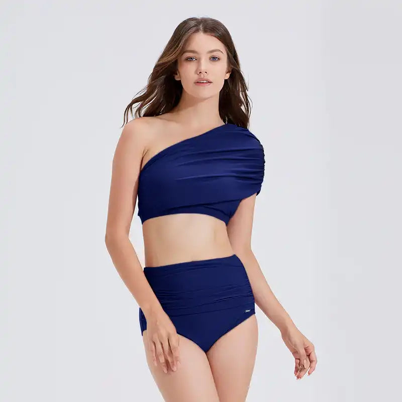 Navy one-shoulder ruched swim top and high-waisted bikini bottoms for women