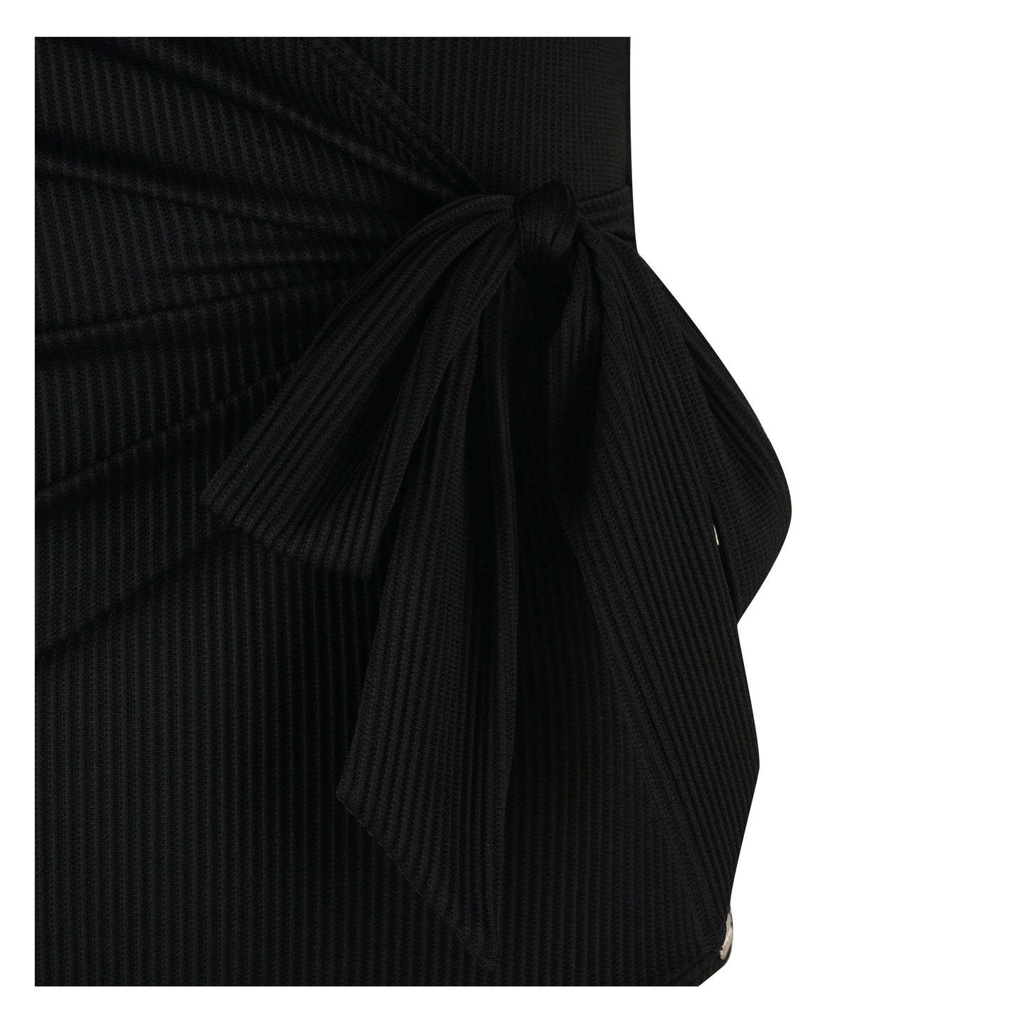 Close-up of the Body Focus swimsuit showing a stylish black knot detail and textured fabric design.