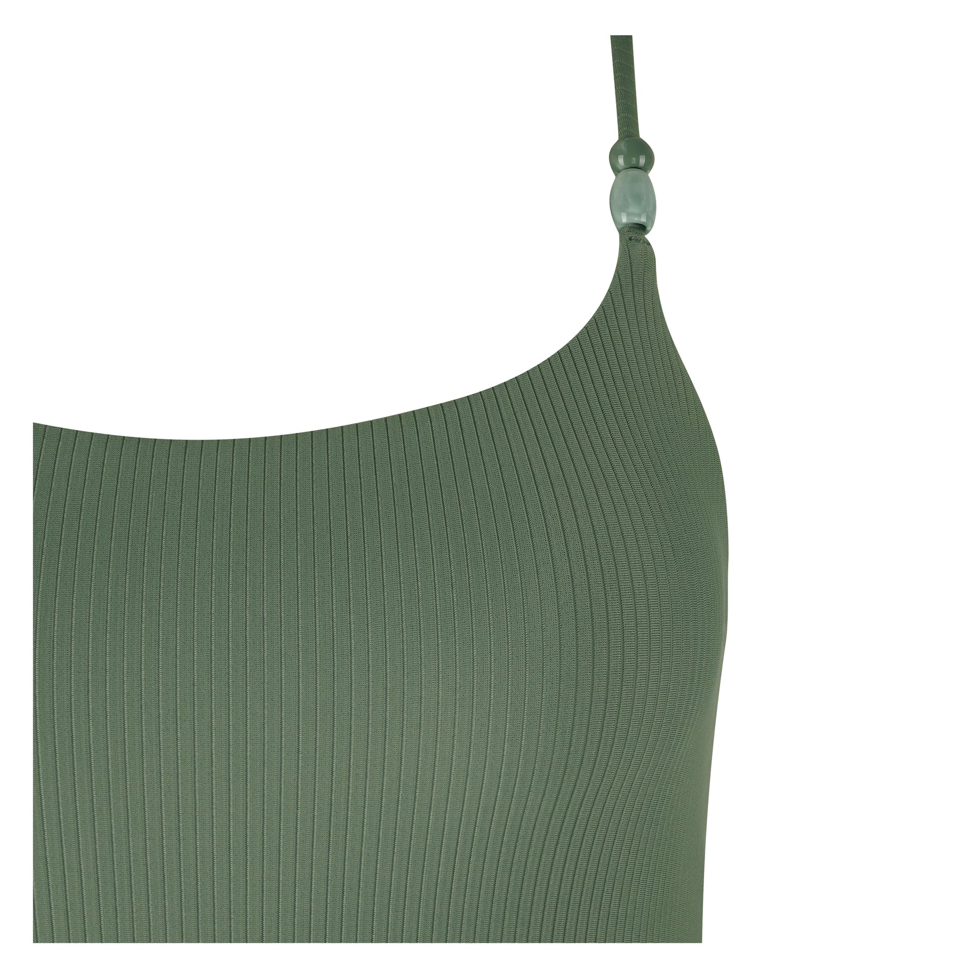 Close-up of a stylish green ribbed beachside swimsuit with decorative strap detail.