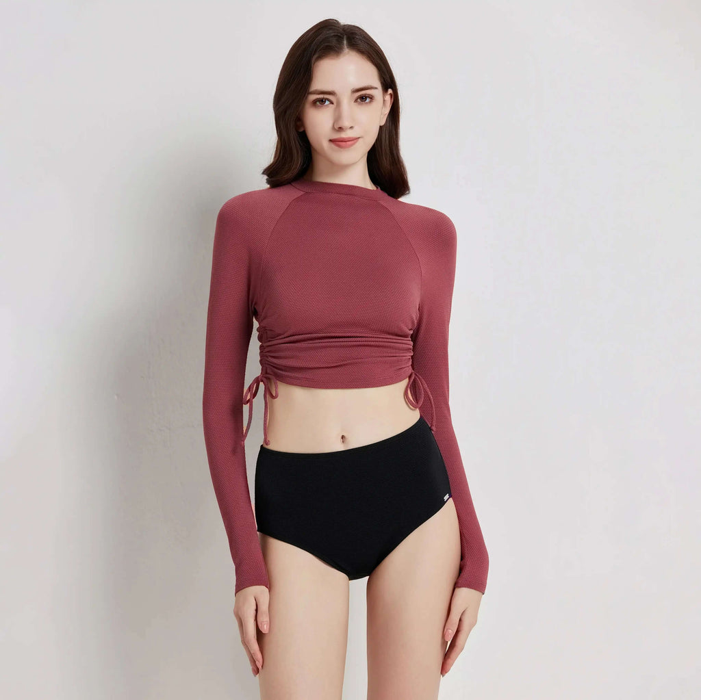 Flowform Rashguard Set featuring a stylish long-sleeve top and matching high-waisted bottoms.
