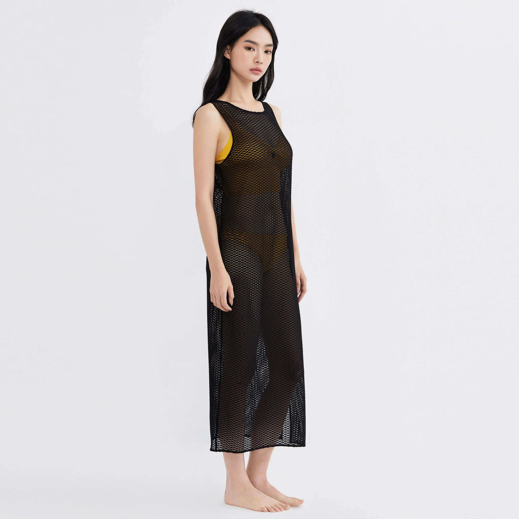 Black mesh cover-up dress over yellow swimwear, designed for real women's proportions