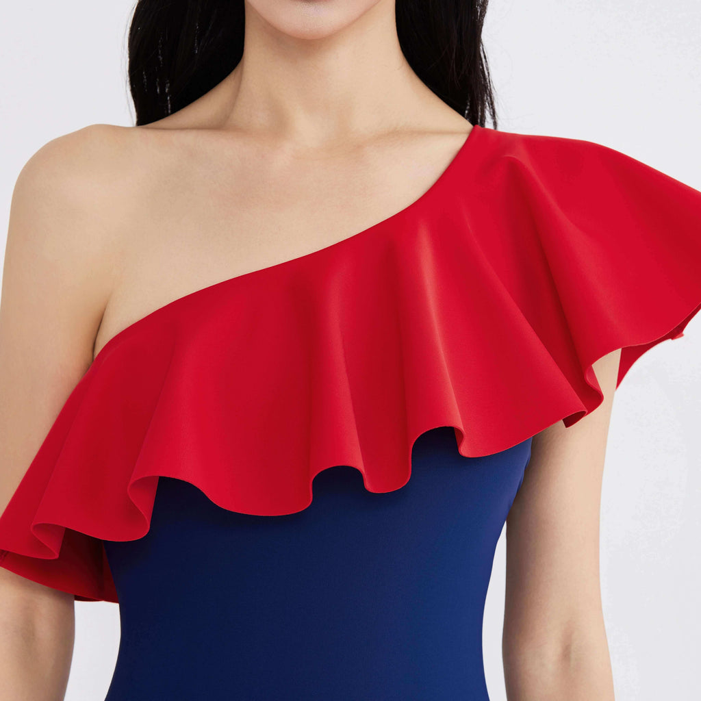 Red ruffle one-shoulder swimwear top with blue base, designed for fluid movement and style.