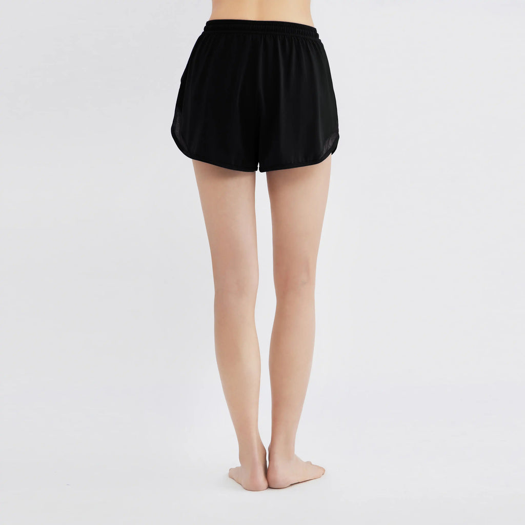 Black activewear shorts with mesh sides, designed for comfort and movement