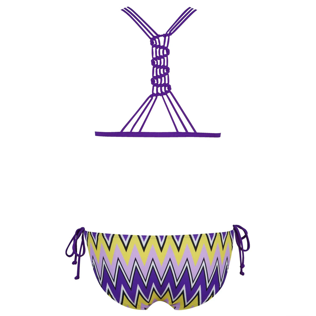 Back view of strappy purple zigzag bikini with side ties, yellow, lilac and black pattern